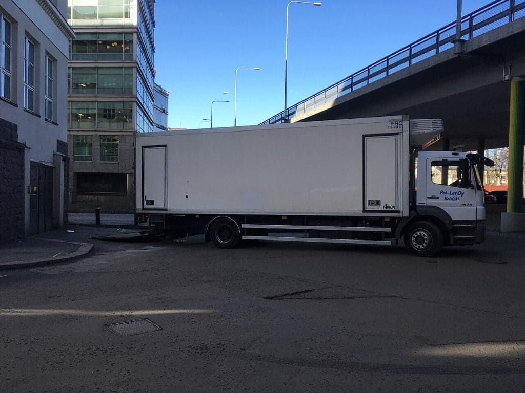 Truck at commercial loading dock door