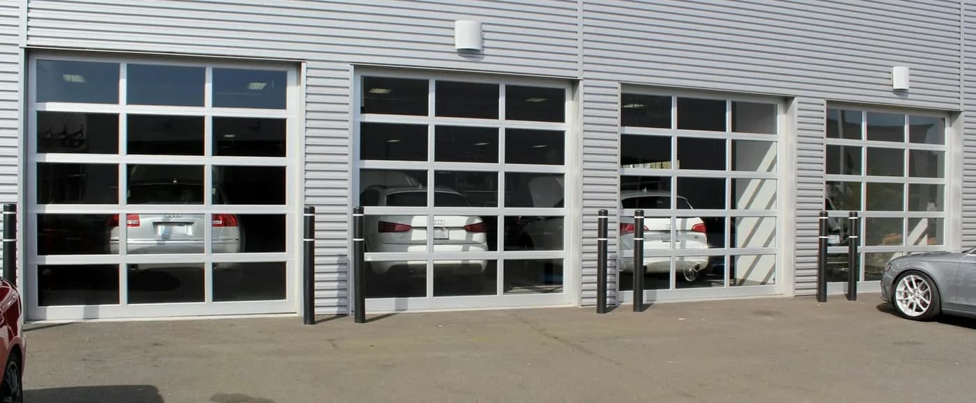 Commercial Garage Door Installation North Vancouver: Hörmann 750A heavy-duty full-view aluminum door of the type installed on Marine Drive showrooms
