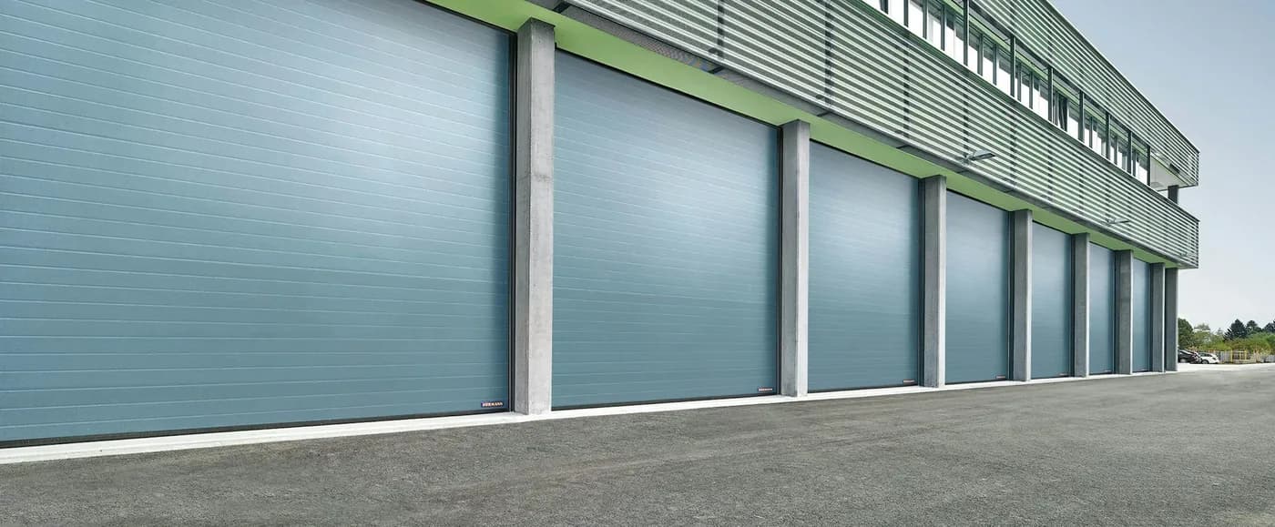 Hörmann 440U insulated sectional door for Braid Street shops in New Westminster