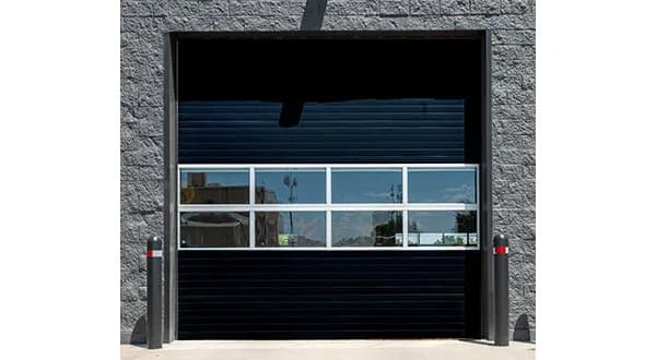 Amarr 2742 polyurethane commercial door in black for Lake City units in Burnaby