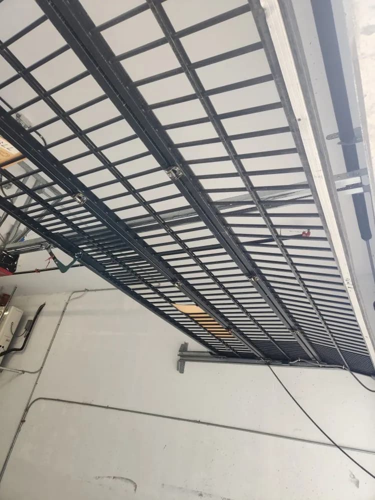 Parkade grille and track seen from below