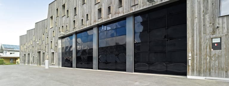 Hormann 450U polyurethane insulated commercial sectional door installed in Vancouver