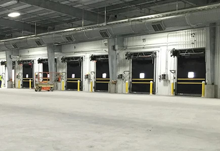 Commercial Garage Door Installation Burnaby: Hörmann HDD insulated dock doors of the type installed on Big Bend distribution buildings