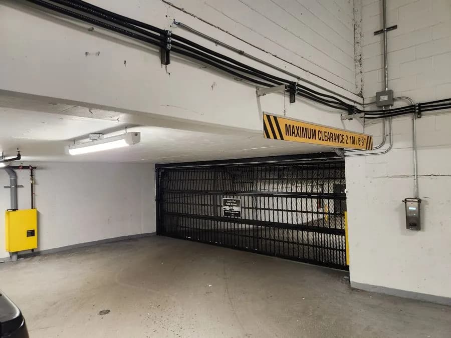 Commercial parkade security grille in an underground strata parkade